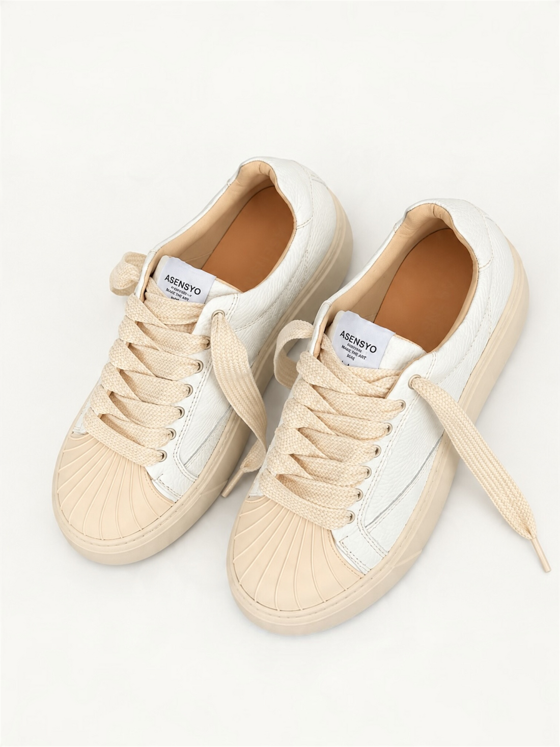 Sneakers in Pelle Martellata Bianca